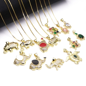 Gold plated copper turtle and elephant pendants with colorful cubic zirconia stones