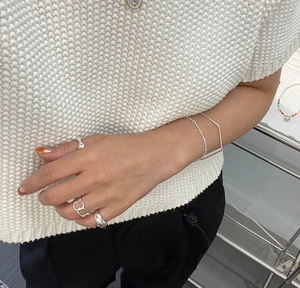 Minimalist S925 sterling silver geometric bracelet and ring set on female model