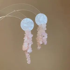 Elegant silver pin earrings with natural pink stone tassels and white shell round discs