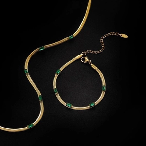 Set collana e bracciale in oro K18 con pietre di zircone verde smeraldo ed eleganti