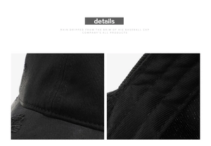 Macro shot of distressed brim and interior mesh texture on black cotton baseball cap