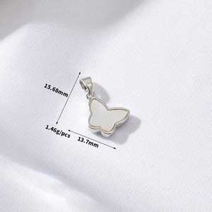 Detailed view of butterfly pendant dimensions 15.68mm by 13.7mm and 1.46g weight info