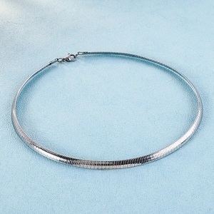 Detail of silver stainless steel snake chain with a secure lobster clasp closure