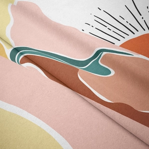 Detail of soft brushed texture and mountain print on Bohemian sunset tapestry fabric