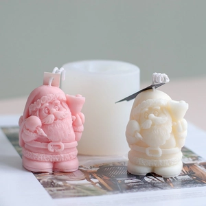 Christmas Santa Claus candle silicone mold with pink and white finished wax figures