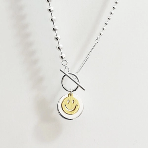 925 silver necklace with OT buckle featuring a golden smile face pendant and mixed chain
