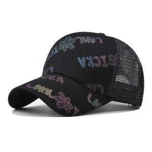 Detailed close-up of the breathable black mesh back and RICKA print on this stylish cap