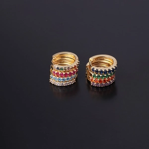 Polished gold huggie earrings set featuring vibrant multi-colored cubic zirconia stones