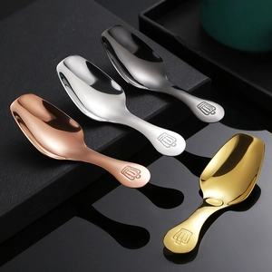 Polished stainless steel tea spoons in four colors with crown engraving on textured mat