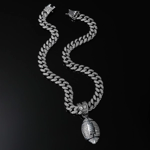 Hip hop silver cuban chain necklace featuring a iced-out rhinestone football pendant