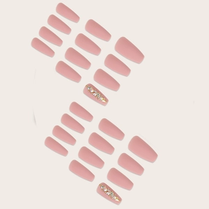 Detailed set of 24 pink matte coffin press-on nails with luxury rhinestone accents