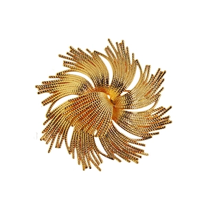 Exaggerated vintage golden flower brooch in brass with a radiant textured floral design