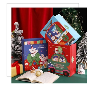 Three-color Christmas gift bags in red and blue featuring festive Merry Christmas designs