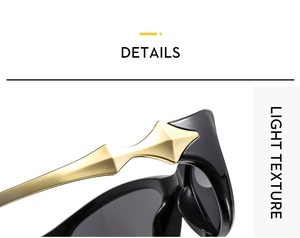 Close-up of black and gold Y2K sunglasses detailing the metallic hinge and light texture