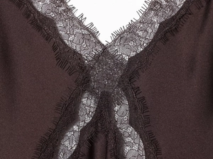 Close-up of the delicate lace neckline detail on this dark coffee satin midi dress