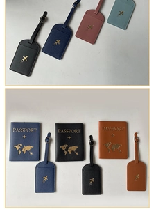 Close-up of travel passport covers and luggage tags set in five colors with gold stamping