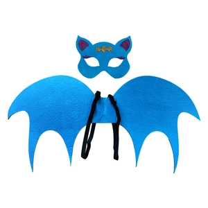 Detailed view of blue felt bat mask and wings with purple sequins and gold bat emblem