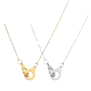 Minimalist stainless steel handcuff necklace set in gold and silver finishes on white background