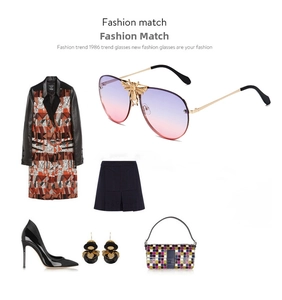 Fashionable pilot sunglasses with bee detail shown as part of a stylish outfit ensemble