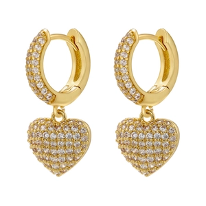 Macro detail of French luxury gold heart earrings featuring micro-pave crystal zircons