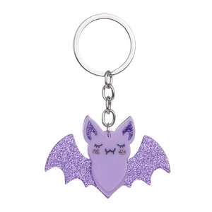 Purple acrylic bat keychain with sparkling glitter wings and a silver metal ring