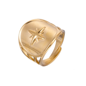 Detail of wide gold band ring with embossed hexagram star and hollowed side design