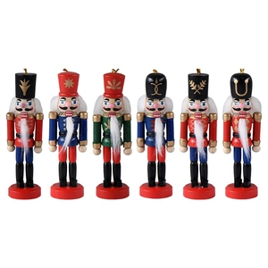 Set of 6 wooden nutcracker soldier ornaments in festive red, blue, and green uniforms