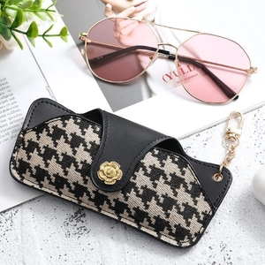 Portable houndstooth glasses case with gold floral snap button and metal hook