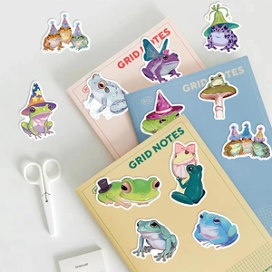 Cute cartoon frog fairy stickers set on grid notebooks for DIY guitar and laptop decor