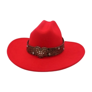 Close-up of red felt cowboy hat with heart-shaped rhinestone buckle and brown leather band