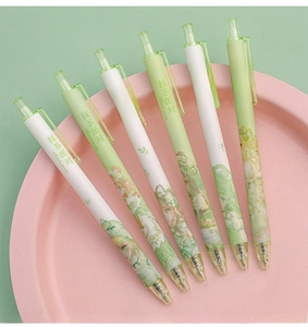 Close-up of Matcha Party themed retractable gel pens with cute anime illustrations