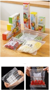 Detail of clear food storage bags with double-track seal, date labels and scale markings