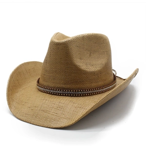 Classic straw woven western cowboy hat with studded leather band on white background