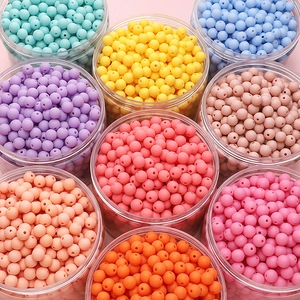 Nine-grid view of colorful matte acrylic beads in transparent jars for DIY jewelry