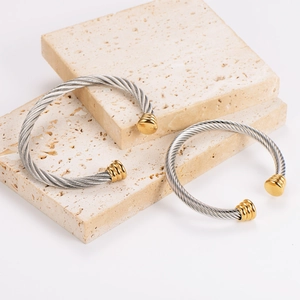 Retro stainless steel twisted cable open bangle with silver cord and gold tone ends