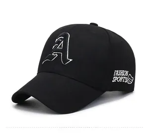 Close-up of black baseball cap with white 3D letter A embroidery and side feather detail