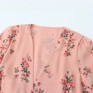 French style V-neck floral print dress in pink and red chiffon with ruffle details