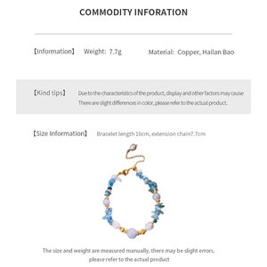 Detailed view of aquamarine beaded necklace showing lobster clasp and extension chain