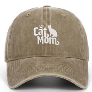 Detailed close-up of Cat Mom embroidery on vintage washed brown cotton baseball cap