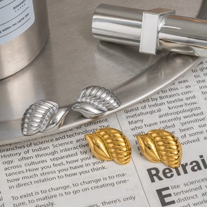 Creative snail shell textured leaf earrings in gold and silver finish stainless steel