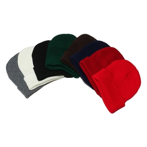 Macro display of ribbed knit beanies in seven colors including grey, white, and navy blue
