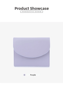 Detail of purple leather card holder with minimalist design and refined stitching