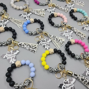 MAMA Cow Head Silicone Bead Keychain Bracelet Cow Print Tassel Wood Bead Wristlet Handmade Mother's Day Fashion Key Ring Jewelry