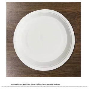 Detailed top view of a white reinforced disposable paper plate with textured edges