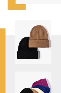 Close-up of thick ribbed knit texture on stylish folded beanie hats for winter warmth