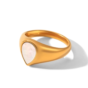 Detail of a matte gold teardrop ring with a white mother of pearl inlay on white background
