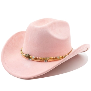 Detail view of pink suede cowboy hat featuring multi-layered ethnic beaded hatband
