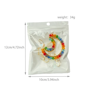 K9 crystal sun catcher dimensions showing 34g weight and 12cm golden star moon design