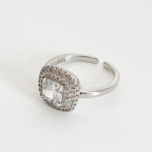 Classic 925 sterling silver ring with large square-cut zirconia and halo setting