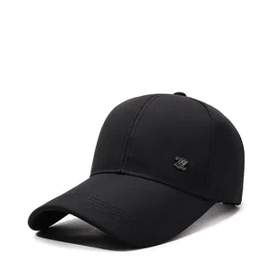 Detail of black cotton baseball cap showing silver Z logo and reinforced visor stitching